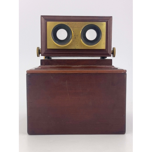 458 - A 19th Century Hudson & Son of Greenwich figured walnut table top stereoscopic viewer, height adjust... 