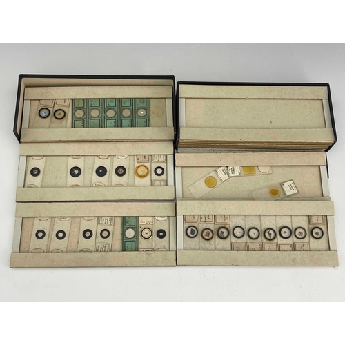 466 - Two black cardboard boxes of laboratory glass specimen slides, written and printed labels (2)