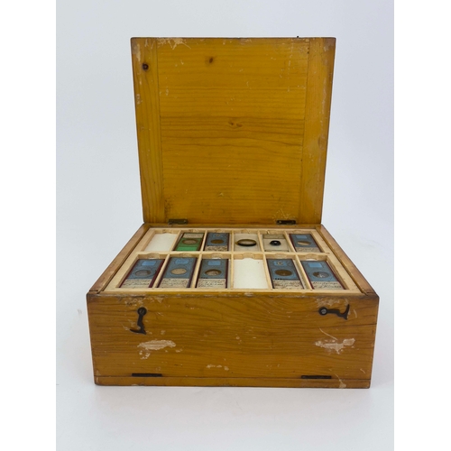 468 - Two wooden boxes of laboratory glass specimen slides, labels written and printed to include those by... 