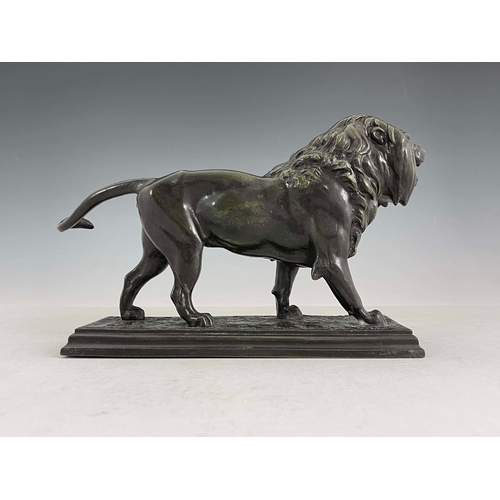 471 - After Alfred  Bayre, bronze model of a standing lion in profile, signed, mounted on a rectangular pl... 