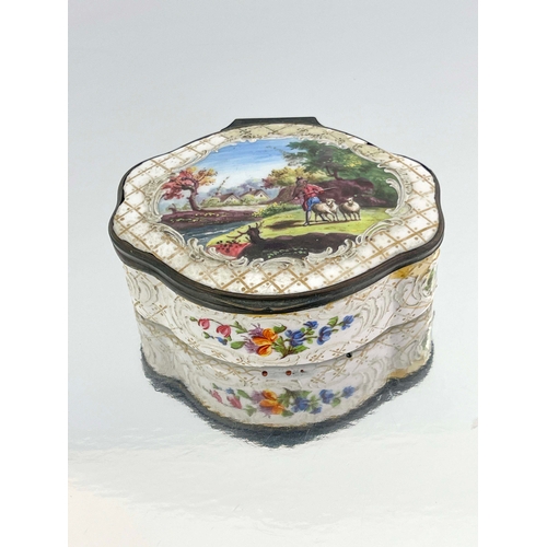 472 - A large Bilston enamelled table snuff box, ogee lobed oval form, the lid painted with a central scen... 