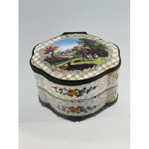 472 - A large Bilston enamelled table snuff box, ogee lobed oval form, the lid painted with a central scen... 