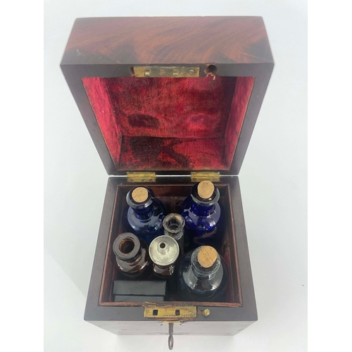 474 - A George III mahogany medicine chest, circa 1820, cuboid form with drawer below, flush campaign hing... 