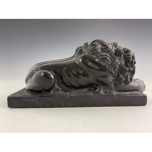 492 - An Italian green marble model of a Medici lion, late 19th Century, modelled recumbent on a plinth, 1... 