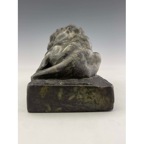 497 - An Italian green marble model of a Medici lion, late 19th Century, modelled recumbent on a plinth, 7... 