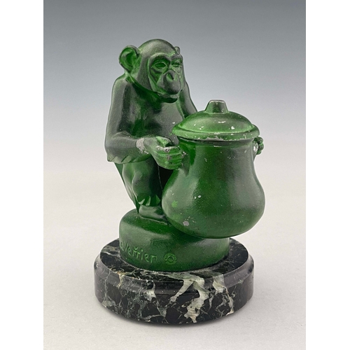 524 - Max Le Verrier, an Art Deco patinated art metal Monkey inkwell, circa 1925, modelled sitting, holdin... 