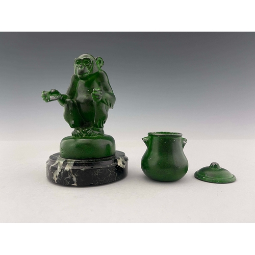 524 - Max Le Verrier, an Art Deco patinated art metal Monkey inkwell, circa 1925, modelled sitting, holdin... 