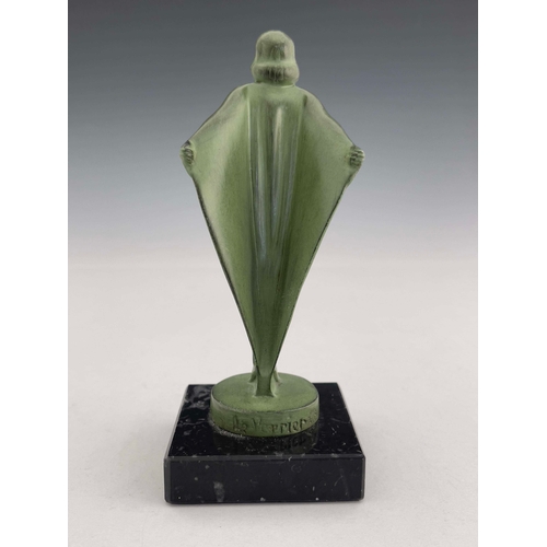 529 - Max Le Verrier, an Art Deco patinated art metal figure, circa 1925, modelled as a caped nide woman, ... 