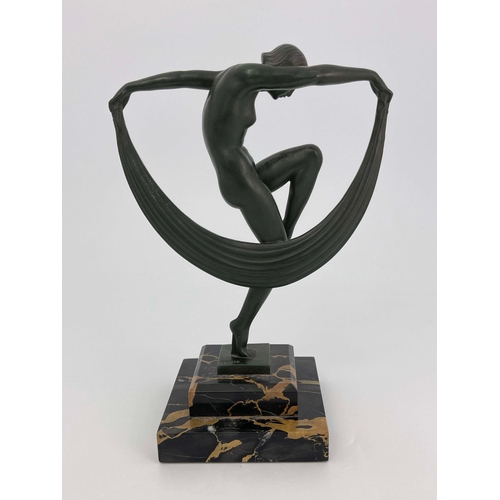 534 - Marcel Bouraine for Max Le Verrier, Scarf Dancer, a green patinated art metal figure, circa 1930, mo... 