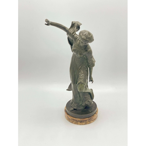 540 - Henri Levasseur, a bronze figure of a woman, circa 1890, modelled bending her knee and reaching towa... 