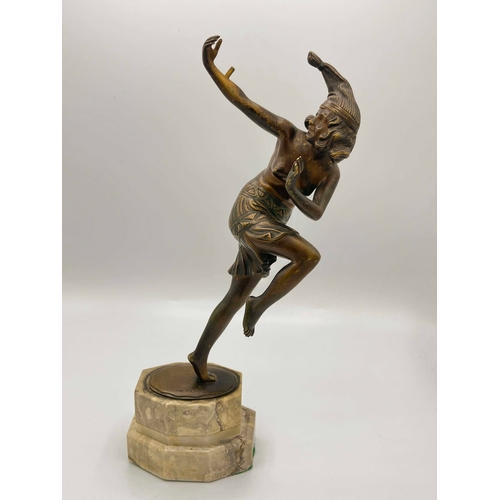 544 - Otto Poertzel, Dancing Woman with Jester, an Art Deco patinated bronze figure, circa 1925, modelled ... 