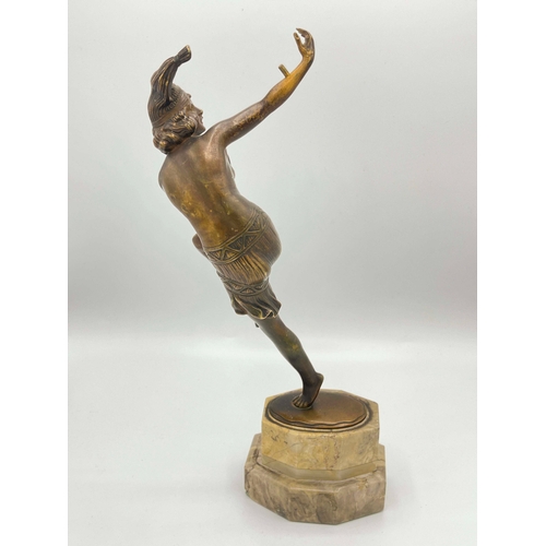 544 - Otto Poertzel, Dancing Woman with Jester, an Art Deco patinated bronze figure, circa 1925, modelled ... 