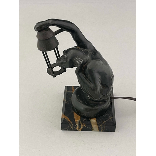 552 - Max Le Verrier, Boubou, an Art Deco patinated art metal figural lamp or car mascot, circa 1930, mode... 