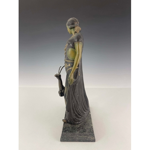 558 - Georges Van Der Voorde, an Art Deco patinated art metal figure group, circa 1925, modelled as a woma... 