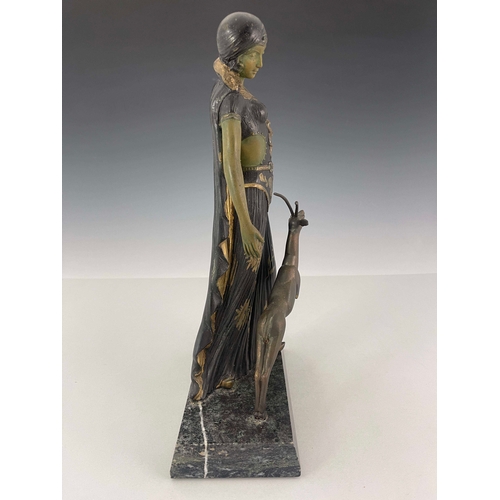 558 - Georges Van Der Voorde, an Art Deco patinated art metal figure group, circa 1925, modelled as a woma... 