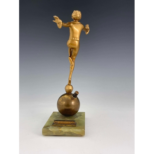 559 - Josef Lorenzl, an Art Deco gilt art metal figural table lighter, circa 1925, modelled as a dancing w... 