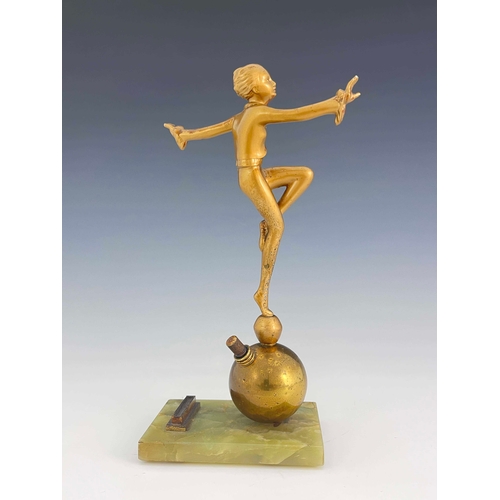 559 - Josef Lorenzl, an Art Deco gilt art metal figural table lighter, circa 1925, modelled as a dancing w... 