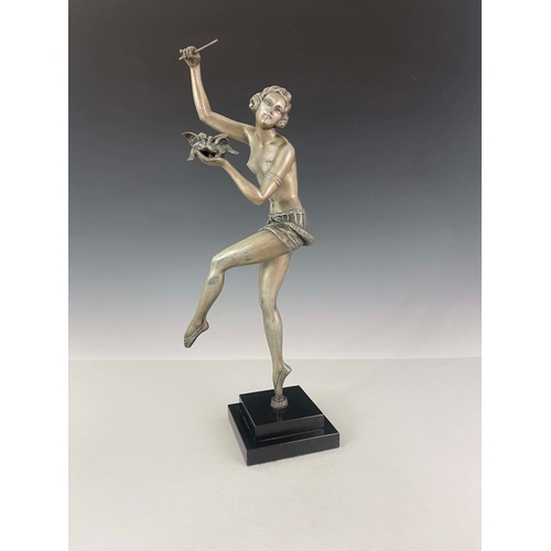 566 - An Art Deco silvered art metal figure, circa 1925, modelled as a dancer with birds, semi nude, on on... 