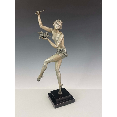 566 - An Art Deco silvered art metal figure, circa 1925, modelled as a dancer with birds, semi nude, on on... 