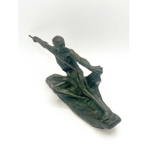 570 - Max Le Verrier, Spear Hunter, a small Art Deco bronze figure, circa 1925, modelled as a reclining ma... 