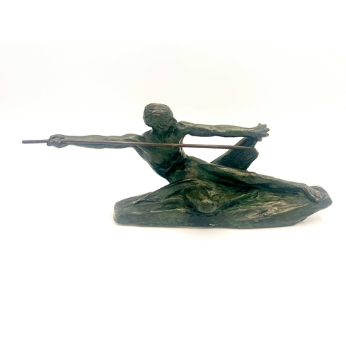 570 - Max Le Verrier, Spear Hunter, a small Art Deco bronze figure, circa 1925, modelled as a reclining ma... 