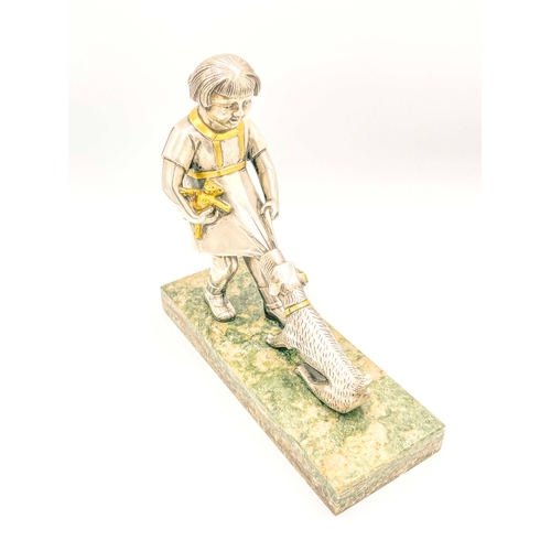 571 - Paul Marec, an Art Deco silvered and gilt bronze figure, circa 1925, modelled as a dog pulling a gir... 