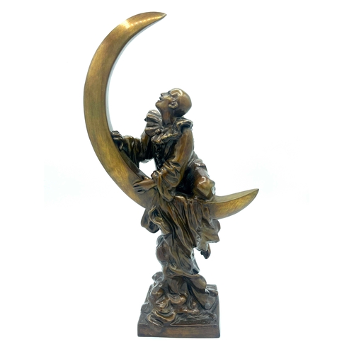 572 - Alfred Jean Foretay, Pierrot Lune, an Art Deco bronze figure, circa 1925, modelled as the clown clim... 