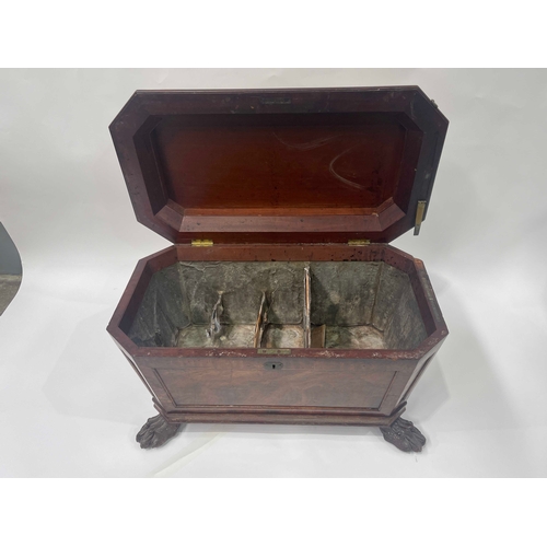 729 - A Regency mahogany cellarette, circa 1825, of sarcophagus form, crossbanded hinged cover with 'stay'... 