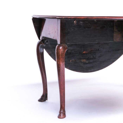 733 - A George II red walnut drop leaf table, circa 1745, possibly Irish, the demi lune flaps supported on... 