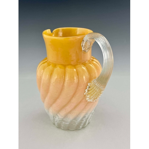 770 - A Stourbridge peach opaque glass jug, probably Stevens and Williams, circa 1880, shouldered form, te... 