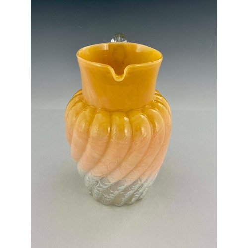 770 - A Stourbridge peach opaque glass jug, probably Stevens and Williams, circa 1880, shouldered form, te... 