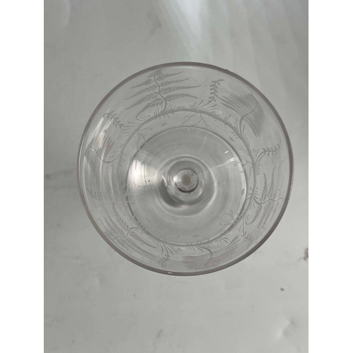 779 - James Powell and Sons, Whitefriars, an Aesthetic Movement wine glass, circa 1870, the ogee bowl etch... 