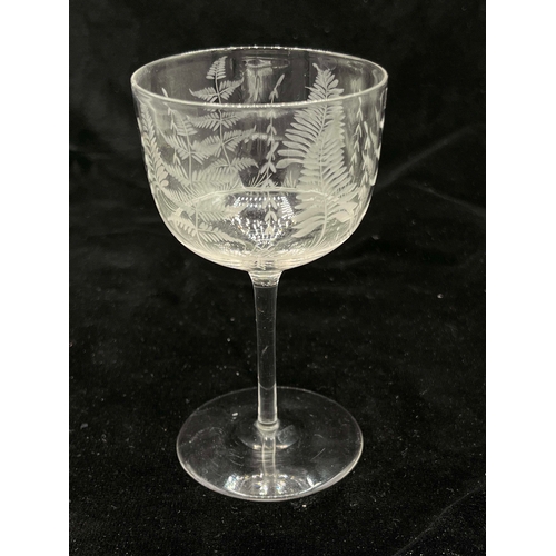 779 - James Powell and Sons, Whitefriars, an Aesthetic Movement wine glass, circa 1870, the ogee bowl etch... 