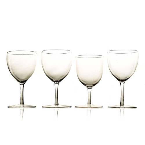 781 - Harry Powell for James Powell and Sons, Whitefriars, a set of three Arts and Crafts wine glasses, ci... 