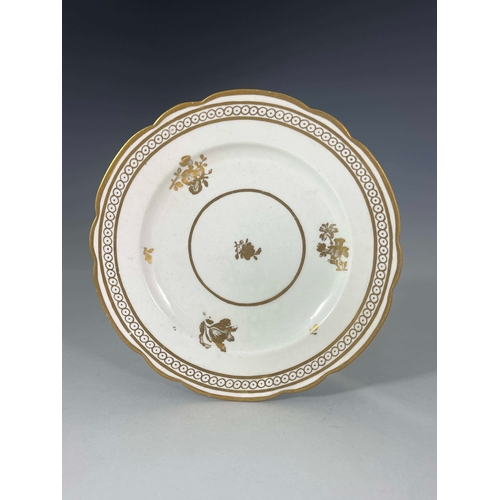 825 - A KPM fruit painted plate depicting quince within relief moulded border, together with a late 19th c... 