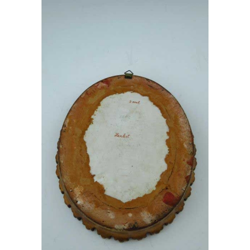 828 - A late 19th Century Berlin porcelain oval convex plaque, Herbst, signed Wagner, impressed marks, and... 