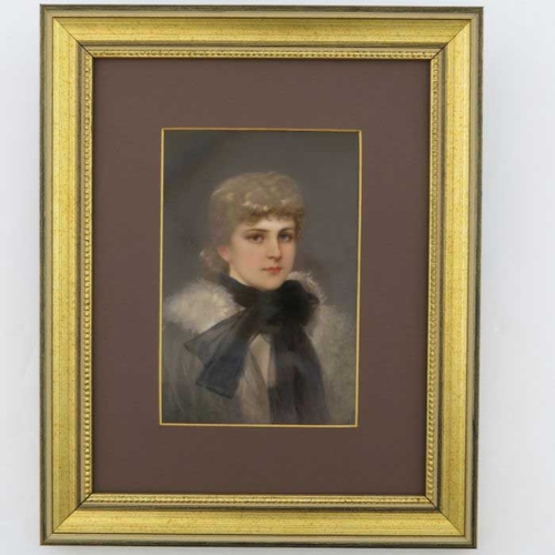 830 - A late 19th Century KPM plaque, painted with a portrait of a young lady, bust length wearing a black... 