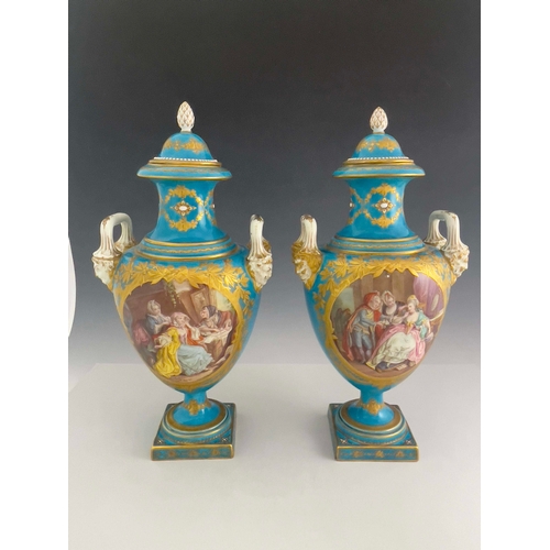 832 - A pair of Sevres style covered twin handled baluster vases, mid 19th Century, pineapple finials to t... 