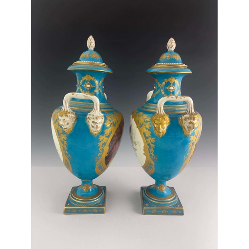 832 - A pair of Sevres style covered twin handled baluster vases, mid 19th Century, pineapple finials to t... 