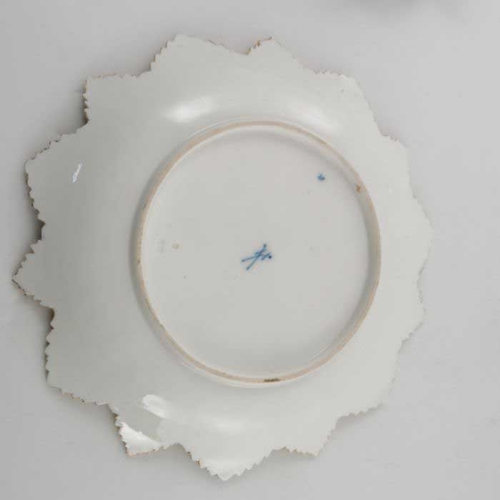 837 - Two early 20th century Meissen relief moulded grape leaf plates, heptagonal denticulated form with p... 