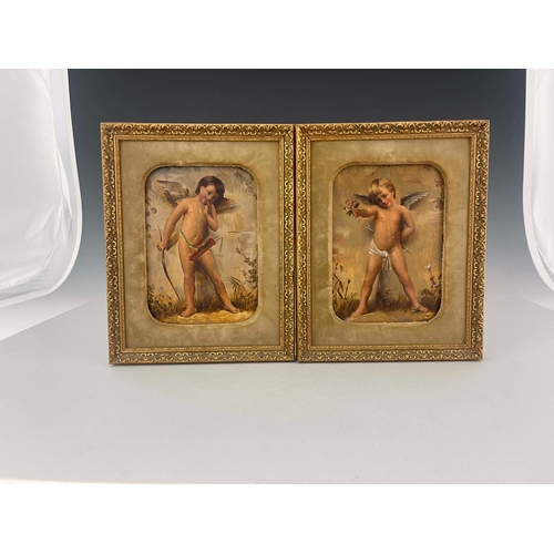 838 - A pair of Goldscheider wall plaques, late 19th Century, each painted with a standing winged cherub, ... 