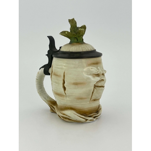 841 - Schierholz, a novelty half litre character stein, modelled as a Sad Radish, pewter mount and inset l... 