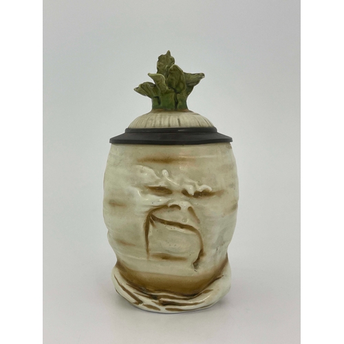 841 - Schierholz, a novelty half litre character stein, modelled as a Sad Radish, pewter mount and inset l... 