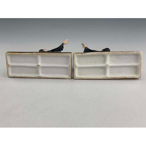 861 - Robj, a pair of Art Deco ceramic bookends, circa 1925, modelled as tambourine dancers, in black high... 