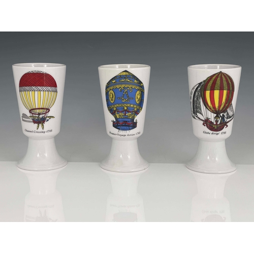 867 - Piero Fornasetti, a set of three Mongolfiere beakers, circa 1955, conical footed cup form, transfer ... 