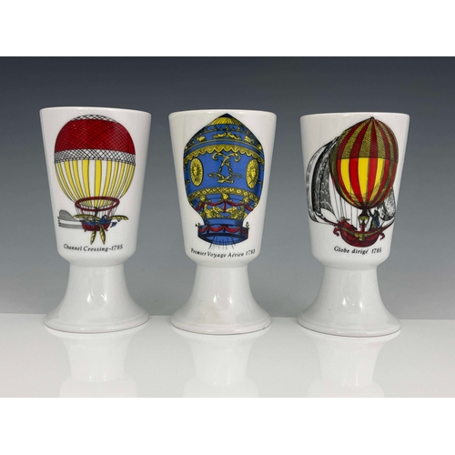 867 - Piero Fornasetti, a set of three Mongolfiere beakers, circa 1955, conical footed cup form, transfer ... 