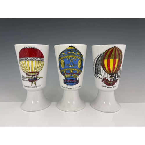 867 - Piero Fornasetti, a set of three Mongolfiere beakers, circa 1955, conical footed cup form, transfer ... 