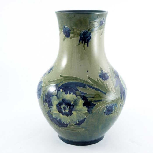 877 - William Moorcroft, a large Late Florian vase, circa 1916, baluster form, impressed Burslem marks and... 