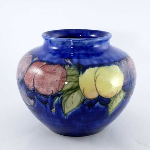 878 - William Moorcroft, a large Wisteria on blue vase, circa 1928, ovoid shouldered form, impressed marks... 