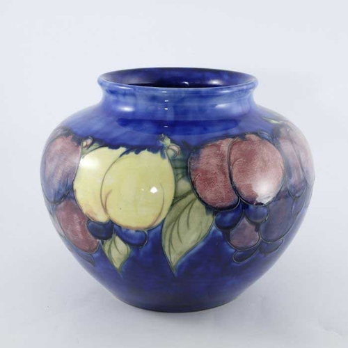 878 - William Moorcroft, a large Wisteria on blue vase, circa 1928, ovoid shouldered form, impressed marks... 